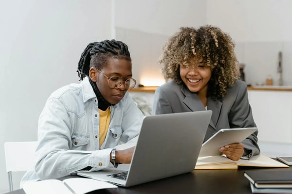 Two employees discovering AI training